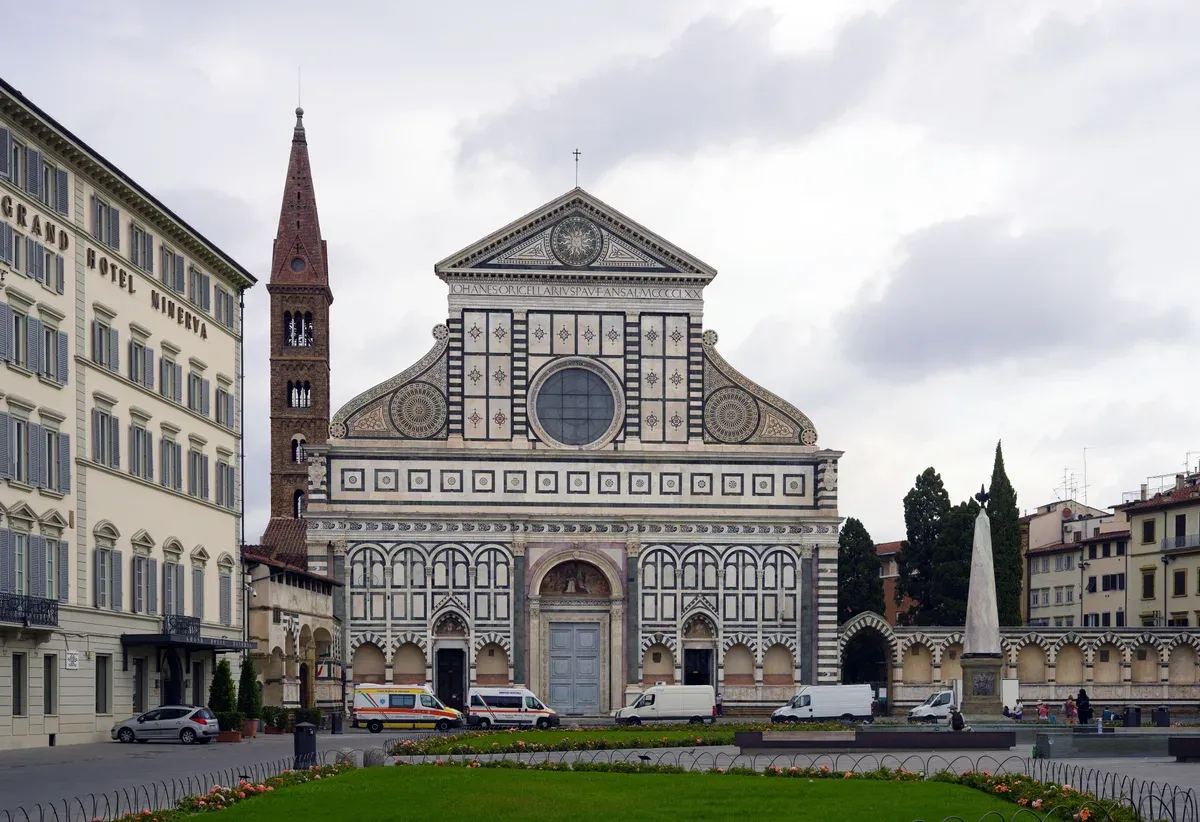 The marble facade of Santa Maria Novella church on its piazza near Florence station, seen on a private tour from Rome to Florence